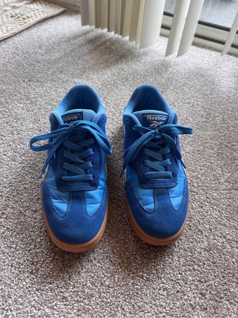 Women’s blueberry Reebok sneakers